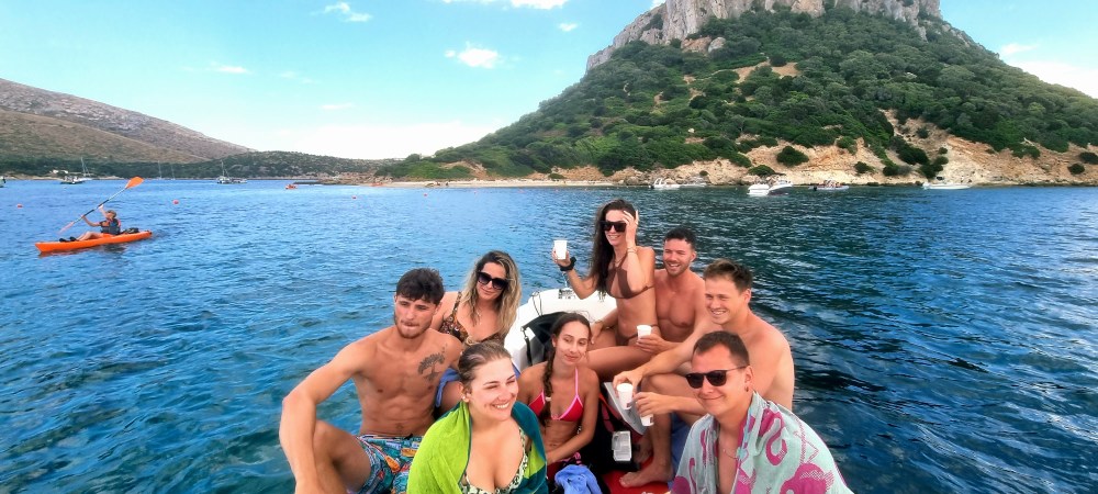 Shared boat tour in Sardinia with dolphin watching and snorkeling