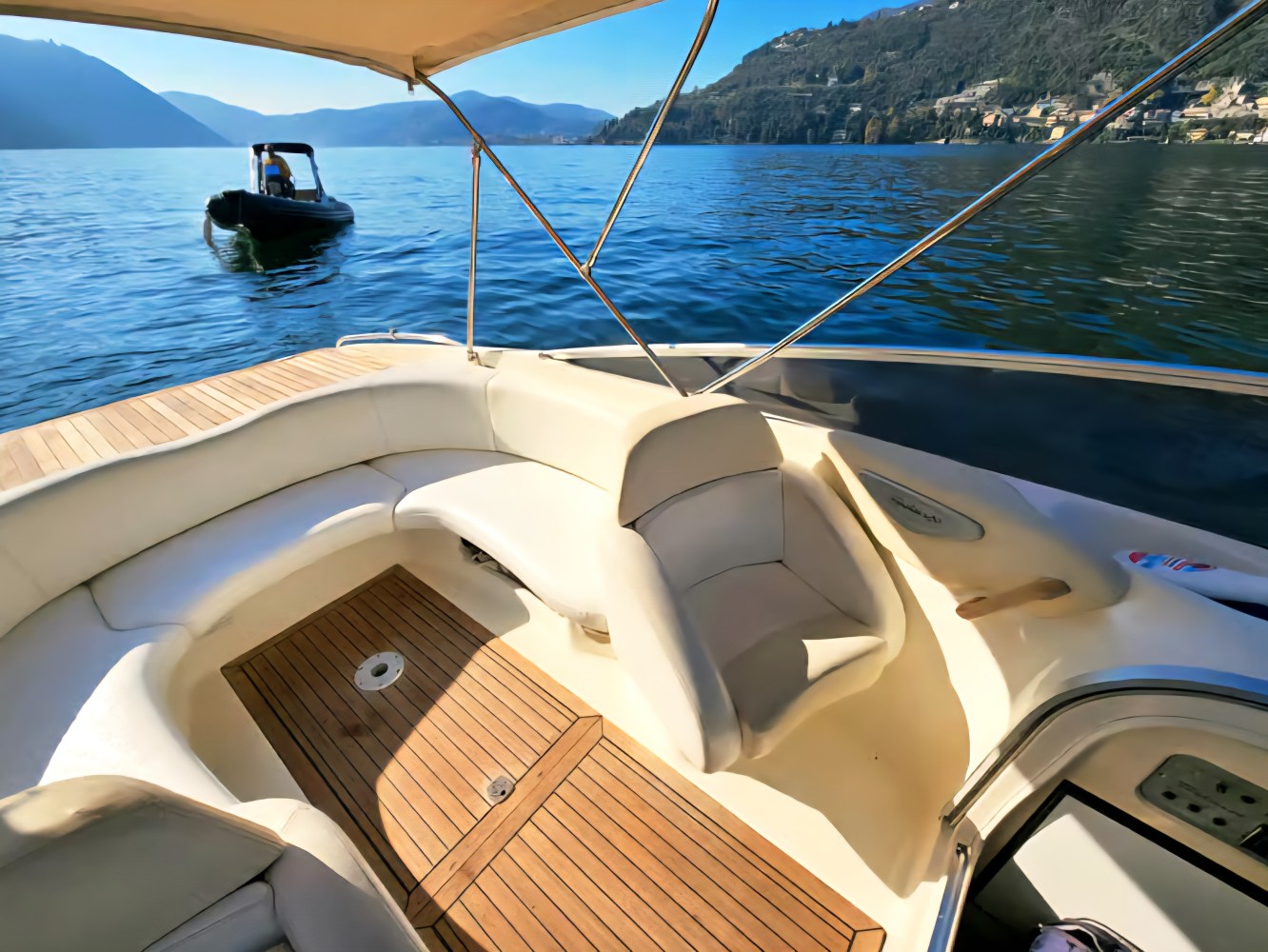 Comfortable private boat on Lake Como with elegant seating