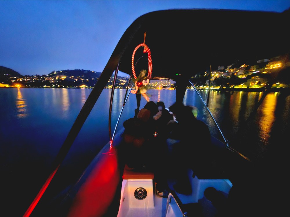 Guests enjoying a Lake Como sunset boat tour with aperitif on board