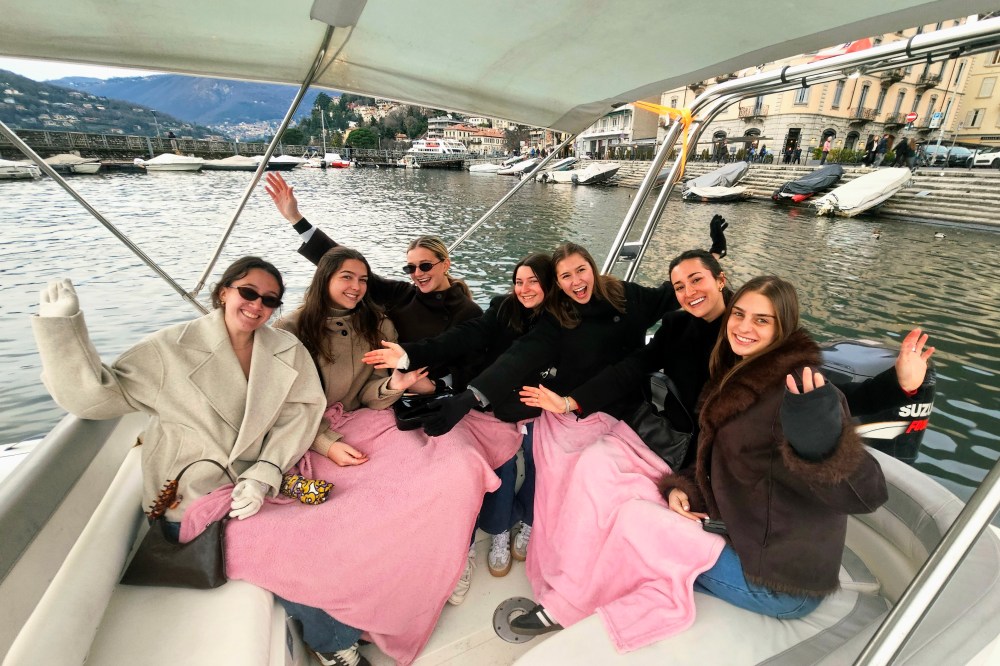 Romantic couple enjoying a Lake Como boat tour